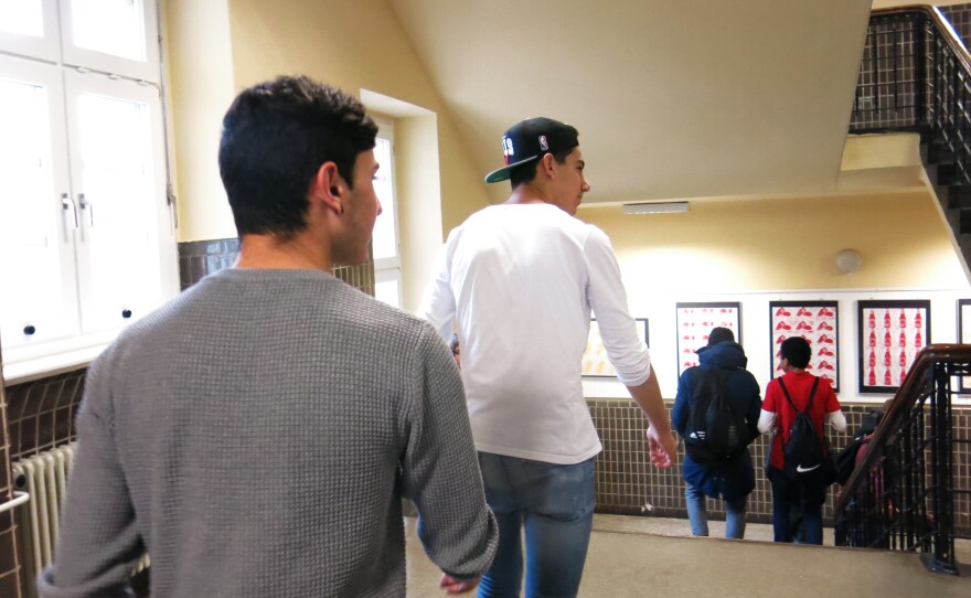 Zara Hussein (left) and Jamil Mohamad Amin walk to class at Johanna-Eck School in Berlin.