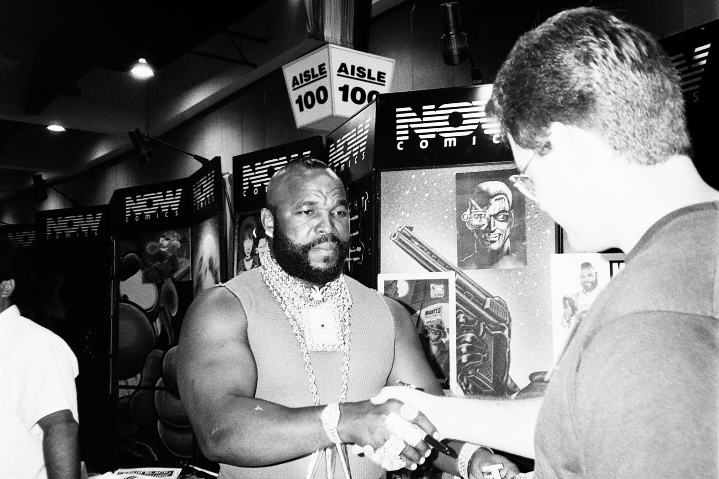 Wrestler and actor, Mr. T (also known as Laurence Tureaud), met fans at the Now Comics booth at the 1992 San Diego Comic-Con International Convention.