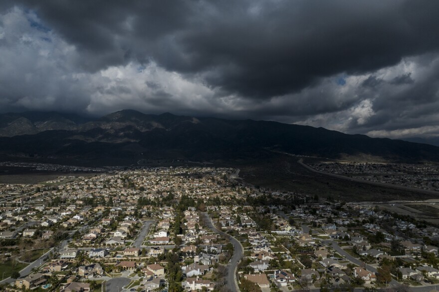 Rain clouds hover over Rancho Cucamonga, Calif., Wednesday, Dec. 7, 2022.