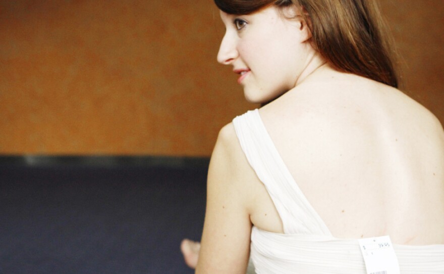 Sophie Adelman tries out her dress — but hasn't taken off the price tag just yet.