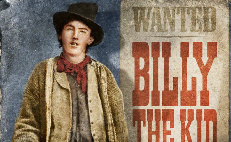 Henry McCarty, alias Billy the Kid with wanted dead or alive poster.