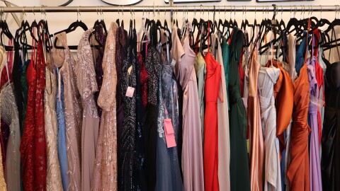Formal dresses line the walls of Juliet Luxury Wear in National City on Friday, Jan. 9, 2026.