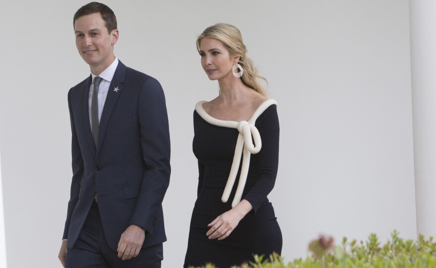 Trump advisers Jared Kushner and Ivanka Trump walk the Colonnade at the White House while attending a state visit by French President Emmanuel Macron on April 24.