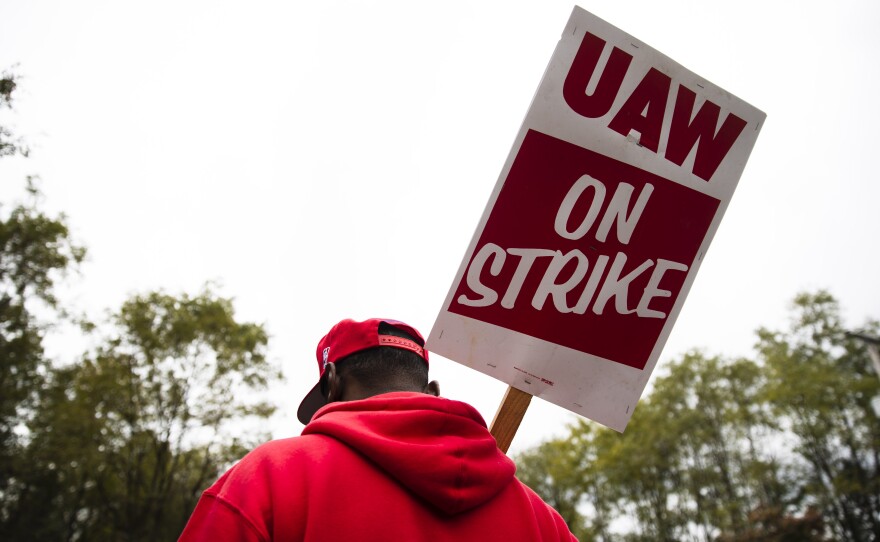 A member of the United Auto Workers pickets earlier this month outside a General Motors facility in Langhorne, Pa. On Friday the union's members voted to ratify a tentative deal with the automaker, bringing an end to a national strike that lasted 40 days.