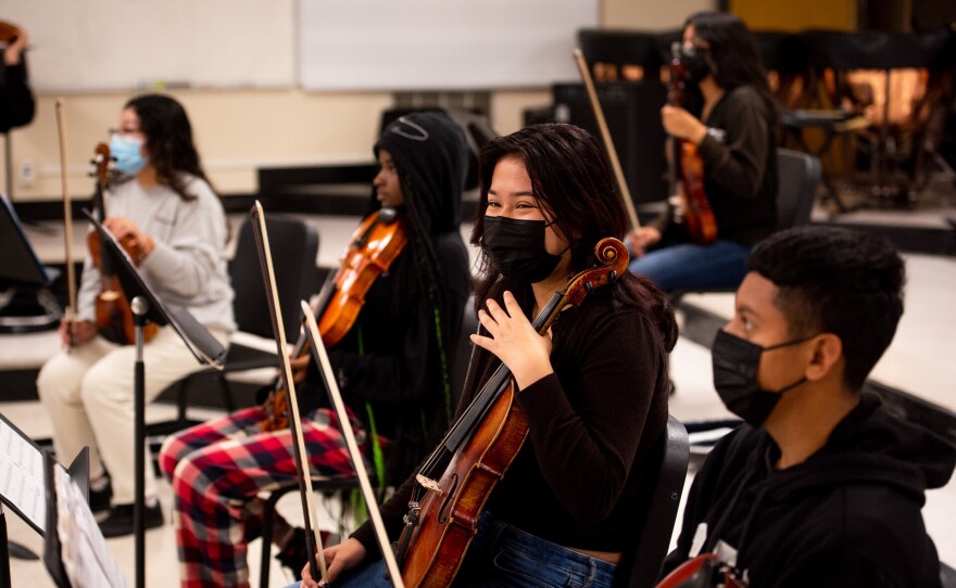 Angelee Montances, 12th grade, plays the viola during orchestra class at Richmond High School in Richmond on Wednesday, Oct. 5, 2022. Richmond High School’s arts programming would benefit from Prop 28, a measure that would roughly double the amount of funding that California gives schools for arts and music education. “We could use it, desperately,” said Richmond High School music director Andrew Wilke. “To not have to worry about finances on top of teaching seven classes would make my job more manageable, which would make me a better teacher and the kids happier,” Wilke said.