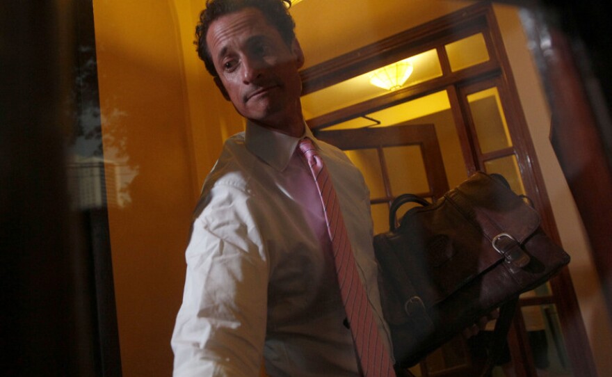 Rep. Anthony Weiner (D-NY) closes the front door of his building when arriving home in New York on June 9. On Thursday, Weiner announced his resignation from Congress because of an extramarital sexting scandal.
