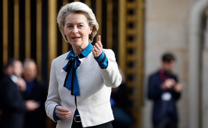 European Commission President Ursula von der Leyen gestures as she arrives at the Palace of Versailles, near Paris, on March 11 for the EU leaders summit to discuss the fallout of Russia's invasion in Ukraine.