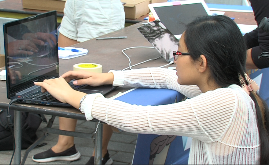 UC San Diego freshman Poiema Kim registers to vote at UC San Diego, Oct. 24, 2016.