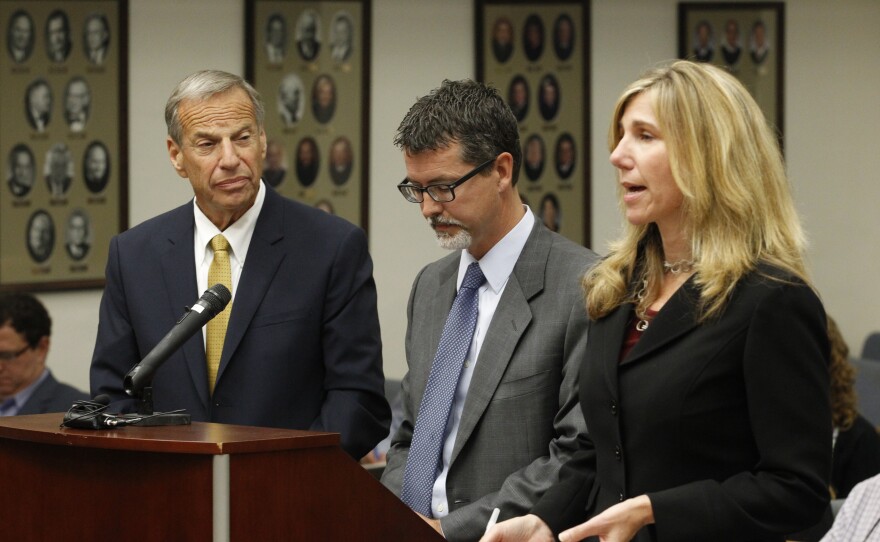 Former San Diego mayor Bob Filner, left, stands with counsel in court before he pleads guilty on state charges of felony false imprisonment Tuesday, Oct. 15, 2013.