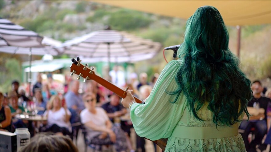 Matthew Lovegood performs as Flamy Grant at the Ramona Ranch Vineyard and Winery on Friday, Aug. 4,
