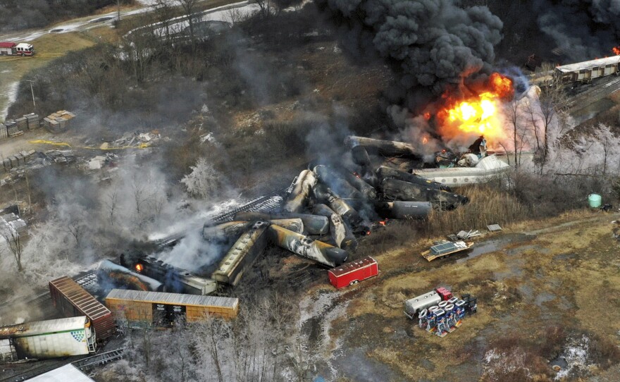 This photo taken with a drone shows portions of a Norfolk Southern freight train that derailed Feb. 3 in East Palestine, Ohio were still on fire on Feb. 4.