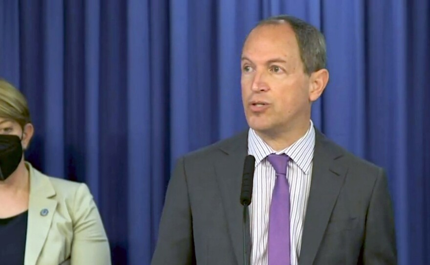 Assemblymember Brian Maienschein introducing his bill to expand the list of convictions that would prompt a 10-year ban on gun ownership at San Diego City Hall, Feb. 25, 2022.