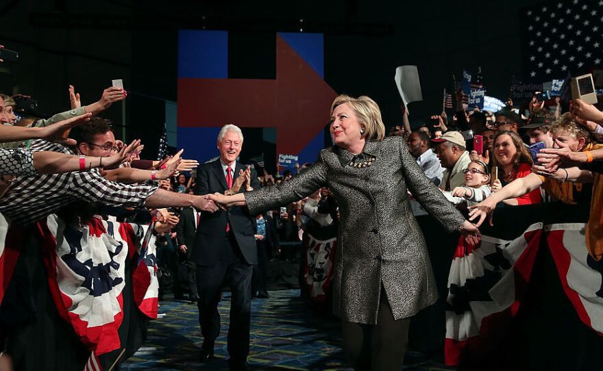 Democratic presidential candidate Hillary Clinton and former U.S. president Bill Clinton greet supporters during a primary night gathering on April 26 in Philadelphia, where Clinton will return for the Democratic National Convention later this month.