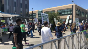 University of California employees picket as a three-day strike begins in San Diego, May 7, 2018. 