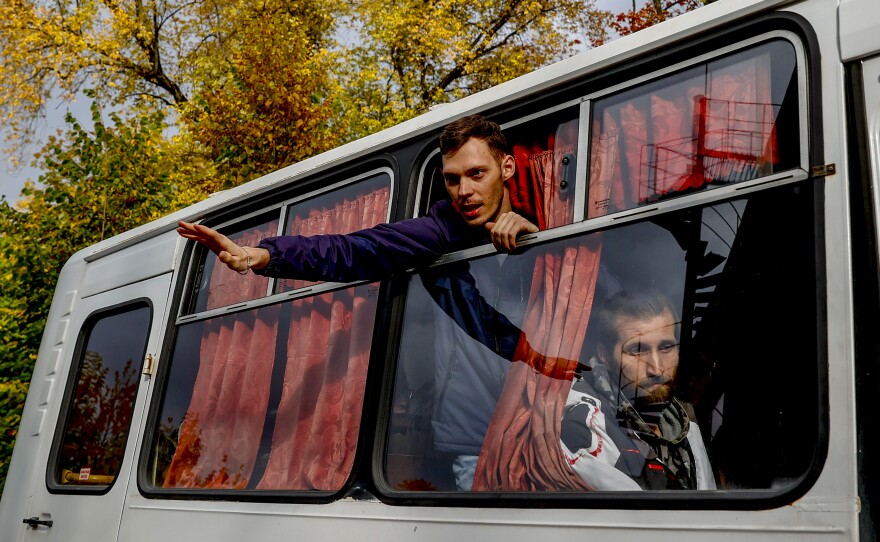 Russian citizens are sent to their units following a military mobilization in Moscow on Sept. 29.