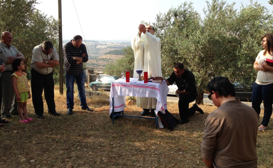 Father Ibrahim Shomali, a Palestinian priest, holds prayer vigils every Friday in the Cremisan Valley near Bethlehem. Israel is planning to build a wall, citing security needs, on agricultural land here owned by a local monastery. Shomali has asked Pope Francis to intervene.