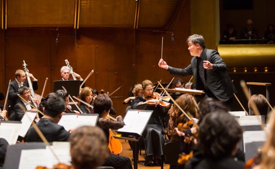 Alan Gilbert conducts the New York Philharmonic with Lisa Batiashivili as soloist at Avery Fisher Hall, Oct. 9, 2014.