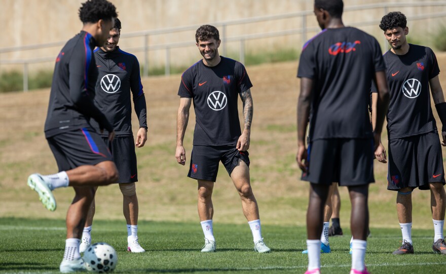 Christian Pulisic (center) warms up with other members of the U.S. men's national soccer team at the Atlanta United training center in Marietta, Ga. on Friday. The U.S. squad is preparing for two key pre-World Cup games in Atlanta against Belgium on Saturday and Portugal on Tuesday.