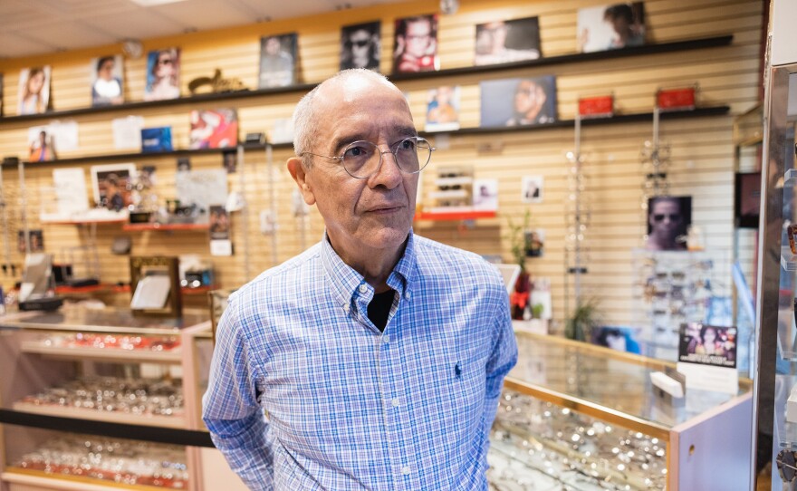 Optician Juan Solano at his eyeglass store in the Bed-Stuy neighborhood of Brooklyn, NY.