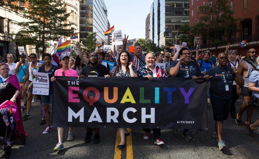 Demonstrators at the front of the crowd lead thousands of others down 17th St. NW during the Equality March in Washington, D.C., on Sunday, June 11.