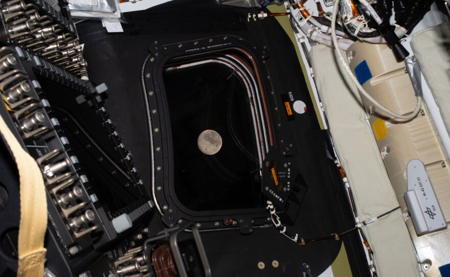 April 6: The moon is seen in the window of the Orion spacecraft, in a photo taken by the Artemis II crew, at the end of Day 5 of the journey to the moon.