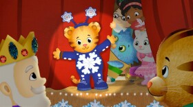 In this thirty-minute holiday musical episode, the Neighborhood is celebrating Snowflake Day! Daniel has a very important role as the snowflake in the Neighborhood’s Snowflake Day Show and he can’t wait to say his lines! The Enchanted Garden is full of excitement and winter cheer as everyone pitches in to make the celebration a true Neighborhood success!