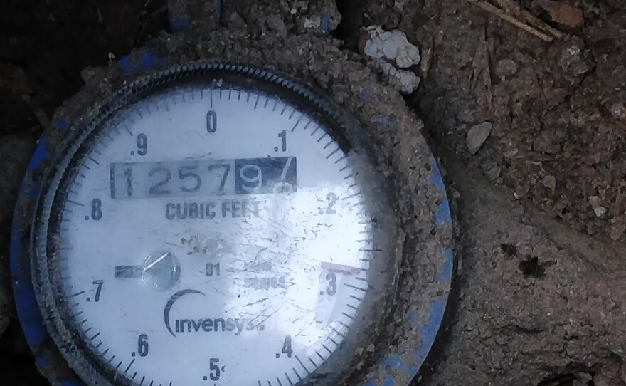 A water meter in the ground is shown at a home in Normal Heights, Dec. 24, 2017