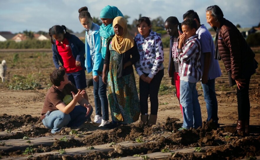 Chef Su-Mei Yu visits Suzie's Farm with a group of Pro Kids.
