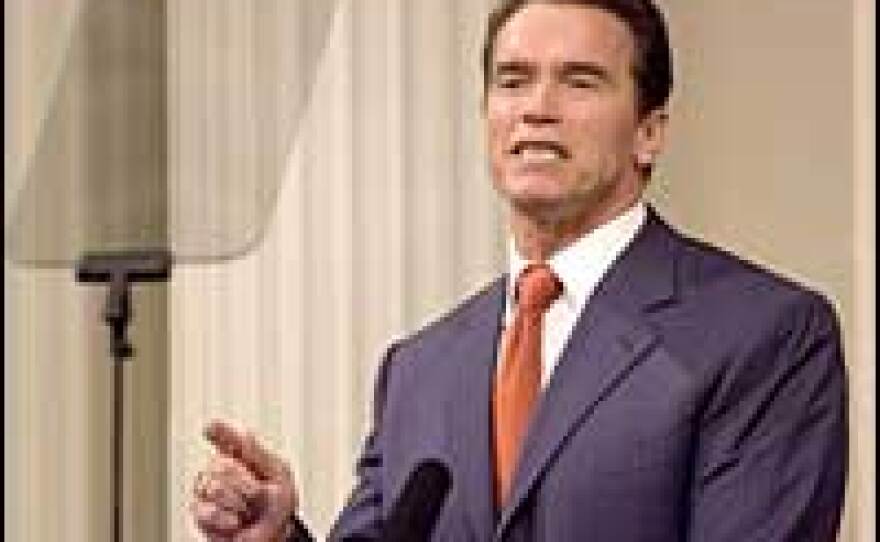California Gov. Arnold Schwarzenegger gestures delivers his State of the State address in Sacramento, Calif., Thursday night.