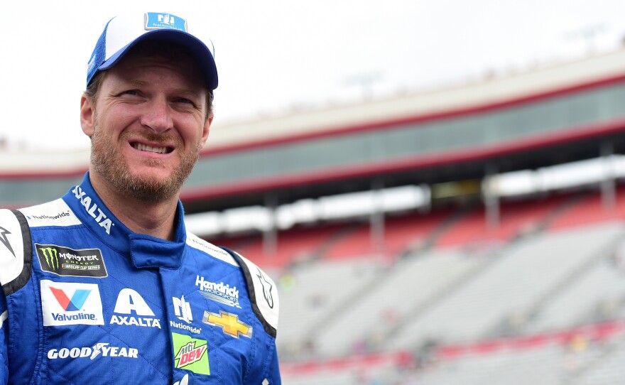Dale Earnhardt Jr., driver of the #88 Nationwide Chevrolet, walks through the garage area during practice for the Monster Energy NASCAR Cup Series Food City 500 at Bristol Motor Speedway in Tennessee on Saturday.