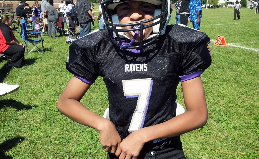 Timothy Williams IV, Lenise White's son, getting ready for a game two years ago, at age 13.