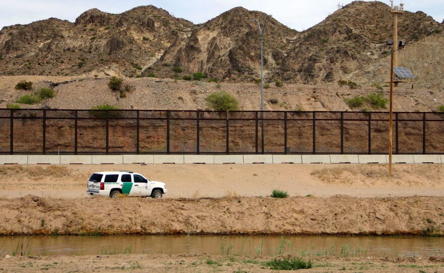 A U.S. Border Patrol vehicle is seen from Mexico while patrolling the border between the cities of El Paso, Texas, and Ciudad Juárez, Chihuahua state, on April 7.