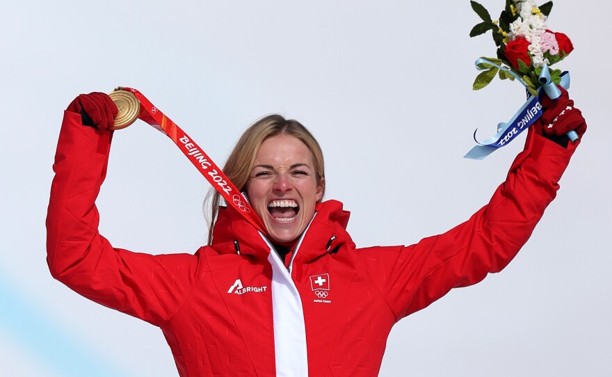 Swiss alpine skier Lara Gut-Behrami celebrates winning her gold medal in the women's Super-G at the Beijing Winter Olympics on February 11, 2022.