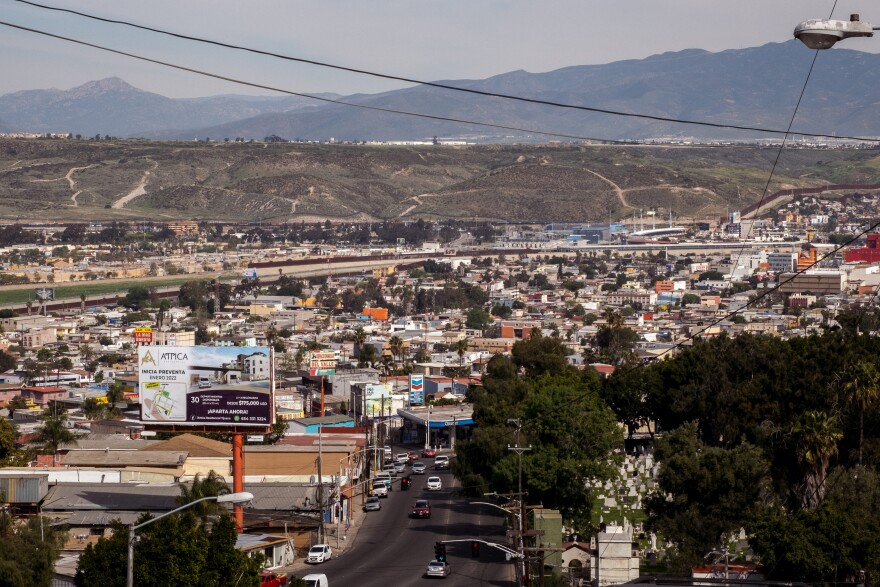 View of Tijuana, the border and San Ysidro from a Tijuana apartment building managed by real estate agent Gustavo Chacon Aubanel, March 2, 2022.