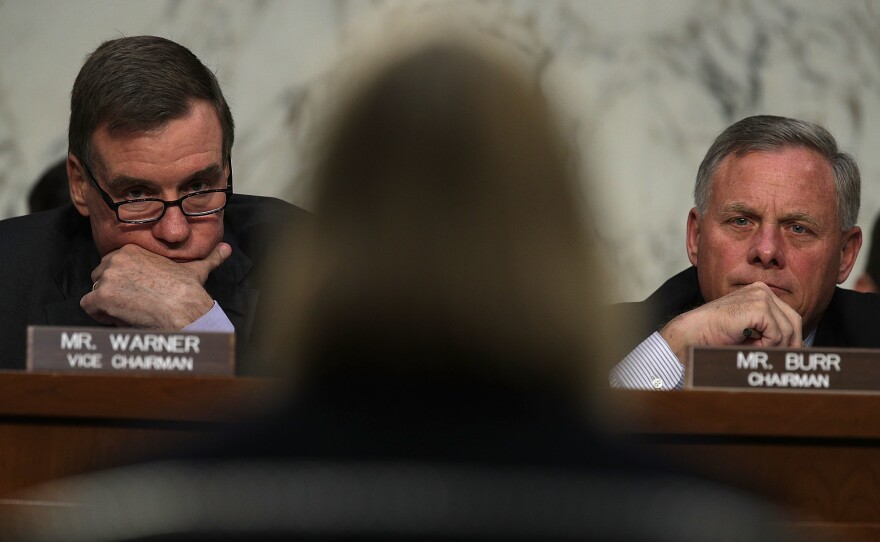 Chairman Sen. Richard Burr, R-N.C, (right) and Vice Chairman Sen. Mark Warner, D-Va., listen during a hearing before the Senate Intelligence Committee on June 21 on Capitol Hill.