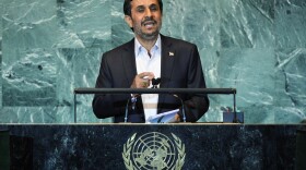 Mahmoud Ahmadinejad (C), President of Iran, delivers an address to the United Nations General Assembly at U.N. headquarters on September 22, 2011 in New York City. 