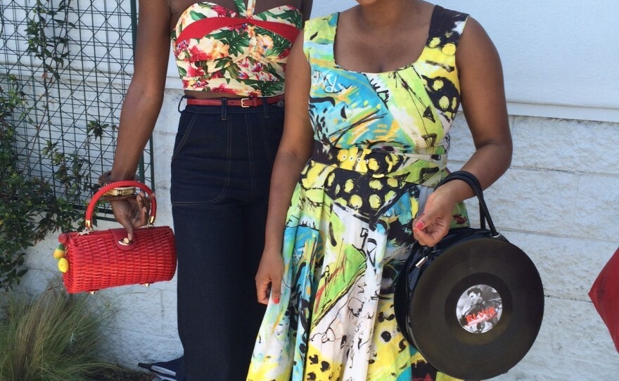 For some shoppers, like Angelique Noire (left) and Jenny Rieu, "ethical fashion" means lining up for a massive vintage clothing sale.