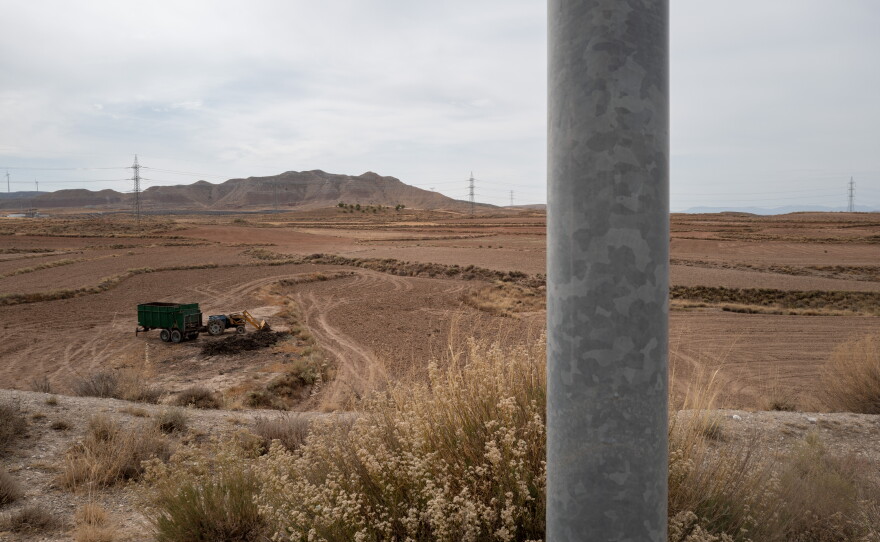 Farmland that is to be developed into a data center complex is seen in Botorrita, Spain, on Sept. 28. Residents of Botorrita village say they first learned of the project when they found the survey markers poking out of the ground on the other side of their garden wall. The government of Aragon is fast-tracking planning permissions under a procedure that also significantly cuts the time the public has to object.