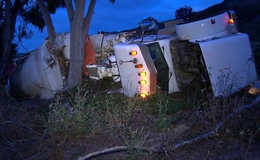 A cement truck overturned on the onramp from westbound state Route 52 to northbound Interstate 5, May 24, 2016.