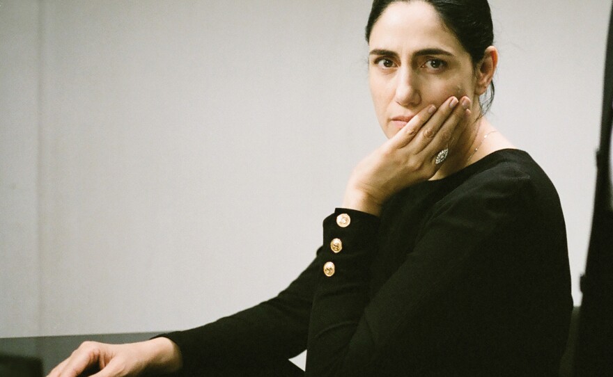 Ronit Elkabetz co-directed the film and plays the lead role. "How come a woman's freedom is at the mercy of her husband?" she asks.