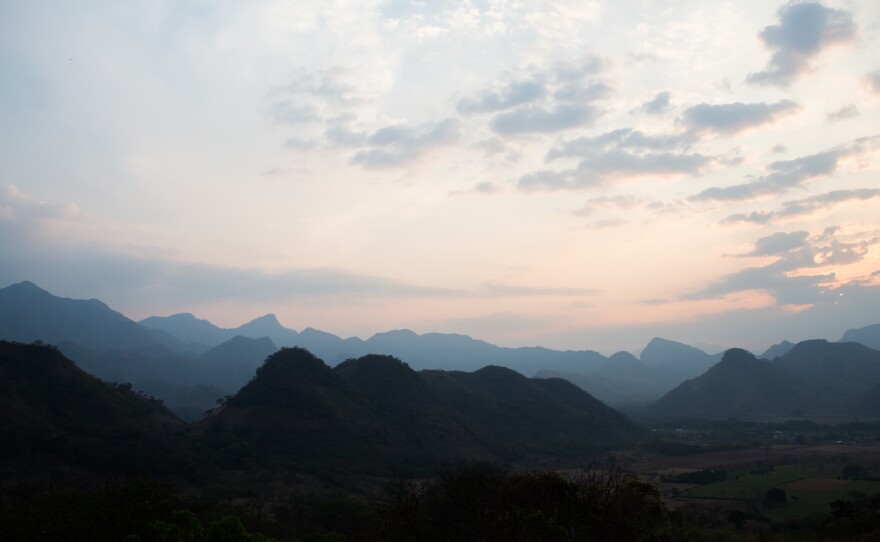Dusk settles on the border between Guatemala and Chiapas, Mexico. U.S. officials estimate they apprehended more than 100,000 people crossing the U.S. Southern border last month — the most in more than a decade.