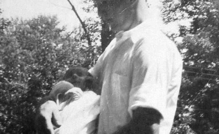 Margaret Ann Wolf Harris, 2 months old, with her father Cody Wolf before he reported to duty.