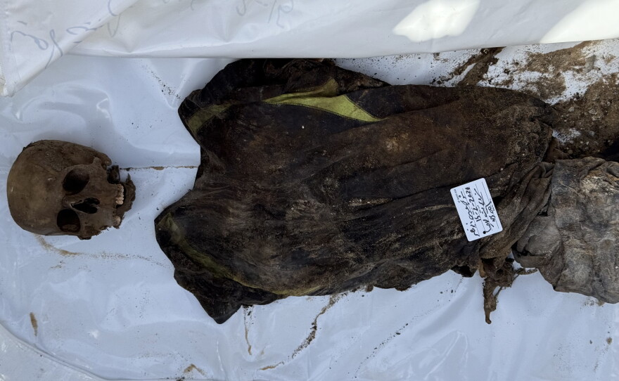 The skeleton of Shawqi Abu Naser, 60, is retrieved from under the rubble on Feb. 16, 2026, more than a year after an Israeli airstrike killed 132 people from the same family in Beit Lahia.
