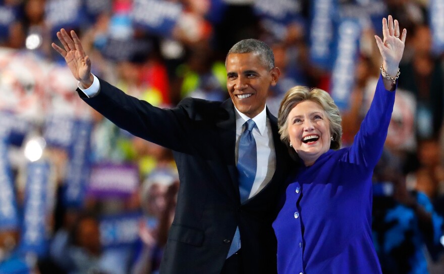 Hillary Clinton joins President Obama onstage after he delivers his speech at the Democratic National Convention on Wednesday.