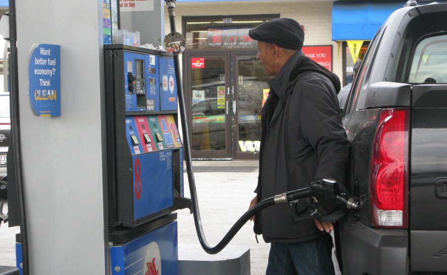 Thomas Harden of Chicago pumps gas into his truck. He says he wouldn't support a gas tax increase.