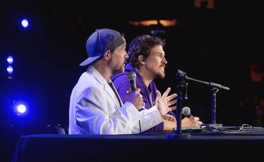 Actor, film producer and director Kevin Smith addresses an audience in this undated photo during Kevin Smith's Comic-Concerts!