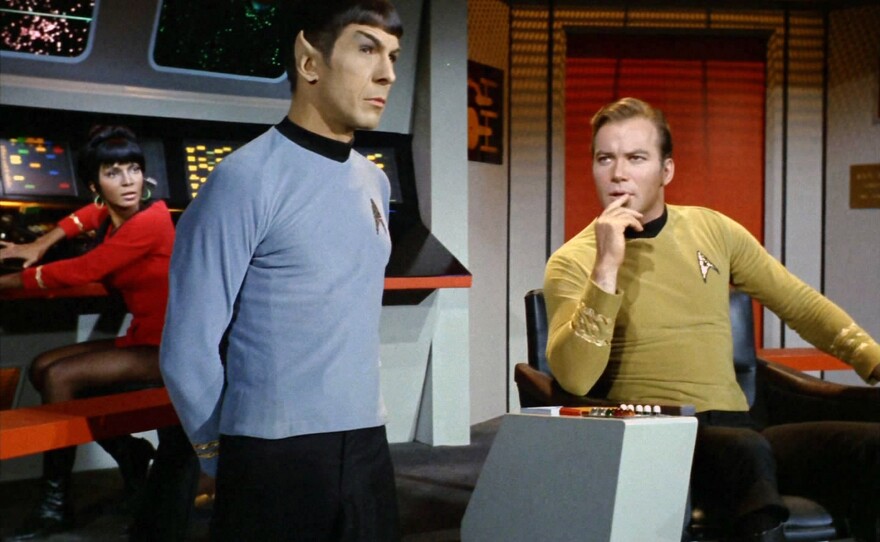 More than 50 years after the <em>Star Trek</em> franchise took TV audiences to alien worlds, William Shatner will visit space aboard a Blue Origin spacecraft. Shatner, right, is seen here with castmates Nichelle Nichols and Leonard Nimoy in a 1967 episode of the show.