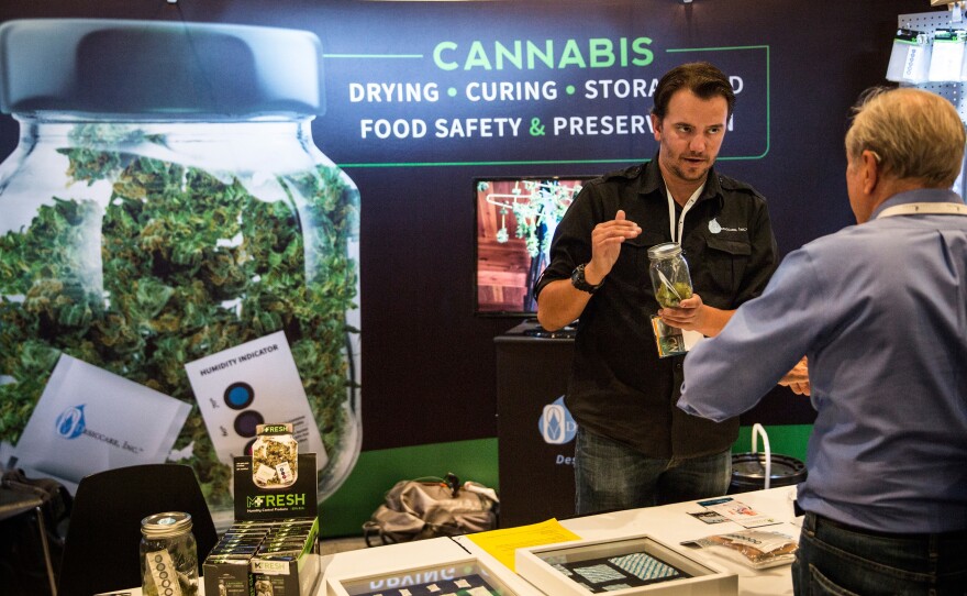 People attend the Cannabis World Congress Expo on June 19, 2015, in New York City. The fledgling legal market for marijuana is around $7 billion, industry researchers say.
