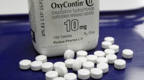 OxyContin pills arranged for a photo at a pharmacy, Feb. 19, 2013.