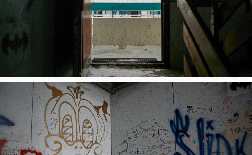 Graffiti covers the stairwell of an apartment block in central Nuuk.